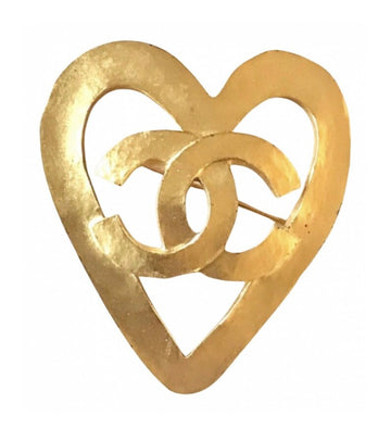 CHANEL Vintage outlined gold tone heart brooch with CC mark
