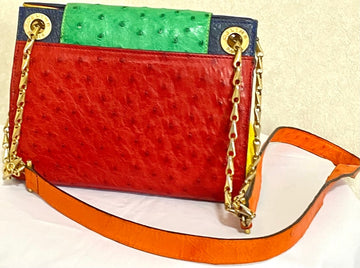 CELINE Vintage genuine ostrich shoulder bag with gold tone chains and red, orange, blue, green, and yellow patchwork design