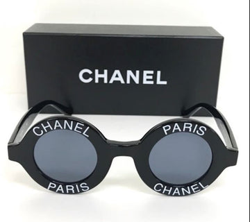 CHANEL Vintage black round frame mod sunglasses with white PARIS logo
