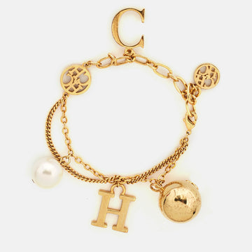 CAROLINA HERRERA CH Faux Pearl Gold Tone Charm Bracelet