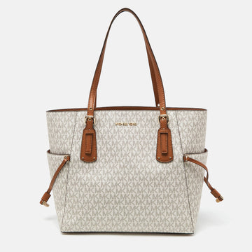 MICHAEL KORS Cream/Tan Signature Coated Canvas and Leather Voyager Tote