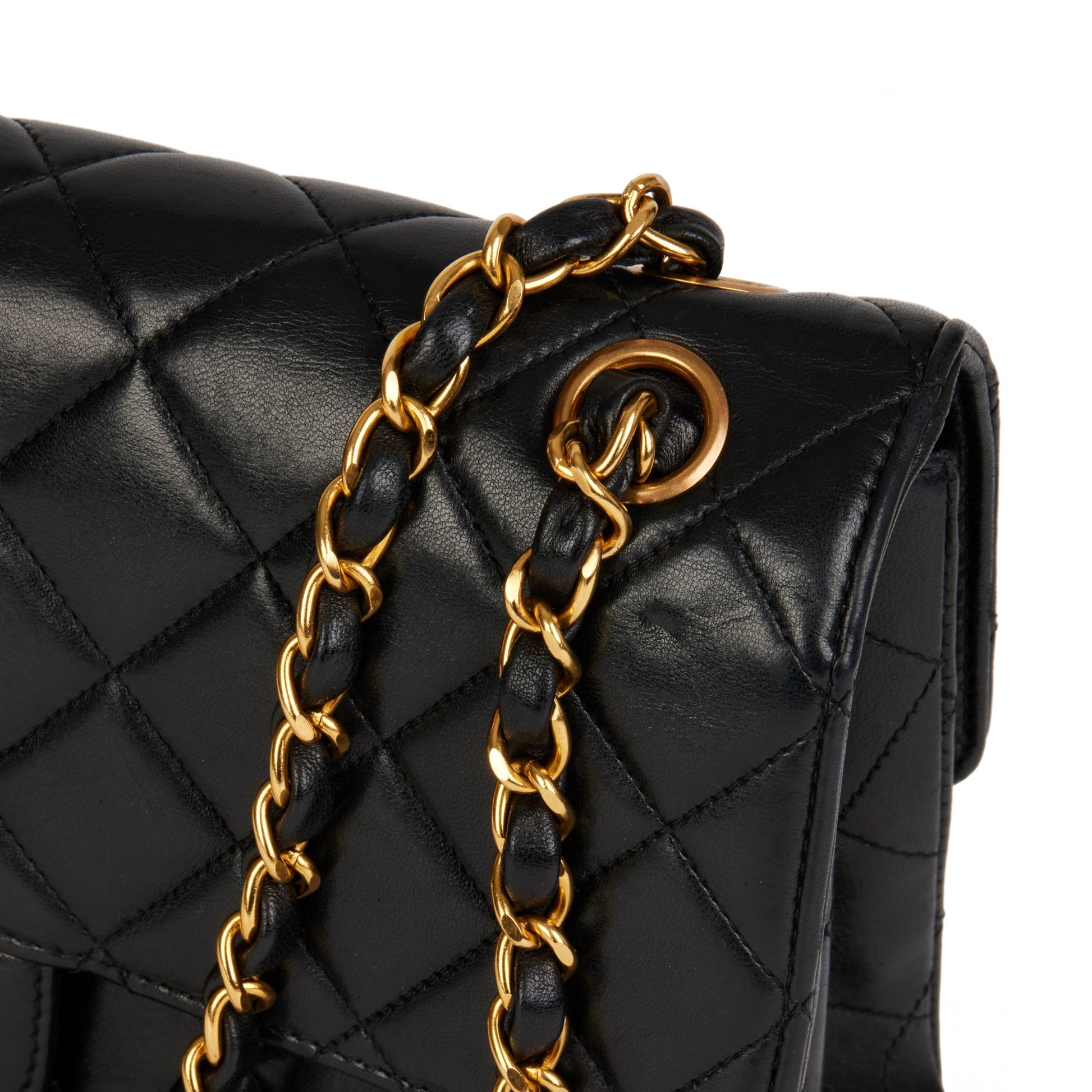 CHANEL DOUBLE SIDED CLASSIC FLAP HANDBAG, black quilted leather with iconic  diamond pattern, gold hardware, chain and leather intervowen shoulder  strap, leather matching interior, inside sticker 4582565, 22cm x 14cm H x