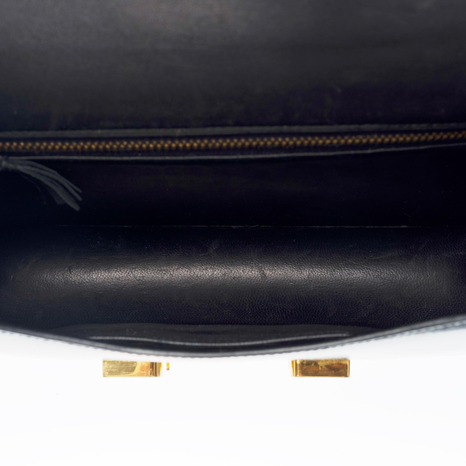 HERMES Rare Constance 23 shoulder bag in black box calf, gold and enam
