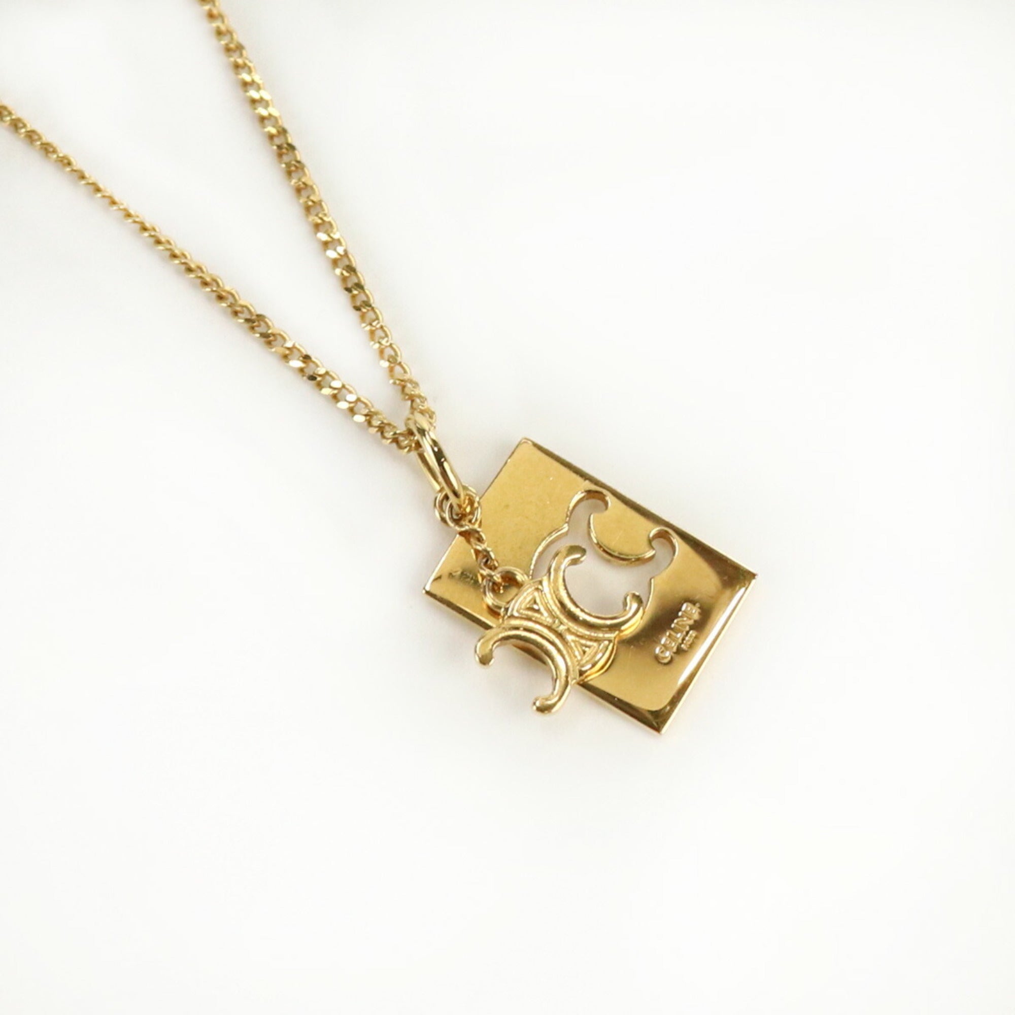 Shop CELINE Triomphe Triomphe Mini Triomphe Necklace in Brass with Gold  Finish (460MS6BRA.35OR) by nanalyme | BUYMA