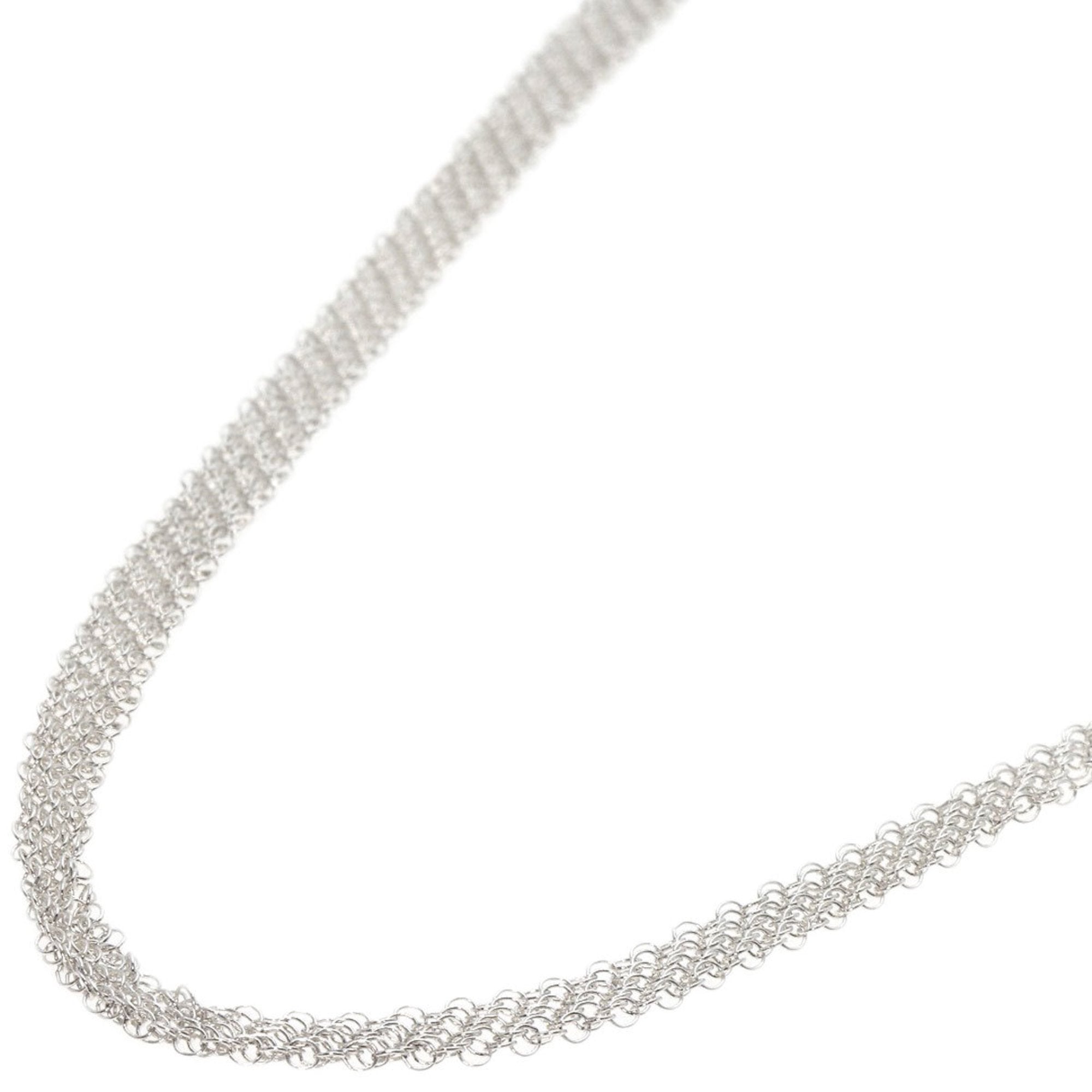 Elsa Peretti® Mesh tassel pendant in sterling silver with a freshwater  pearl. | Tiffany & Co.