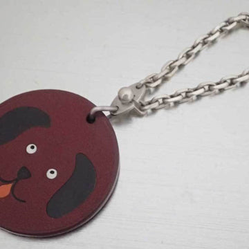 HERMES charm animal motif dog brown leather x silver metal fittings bag