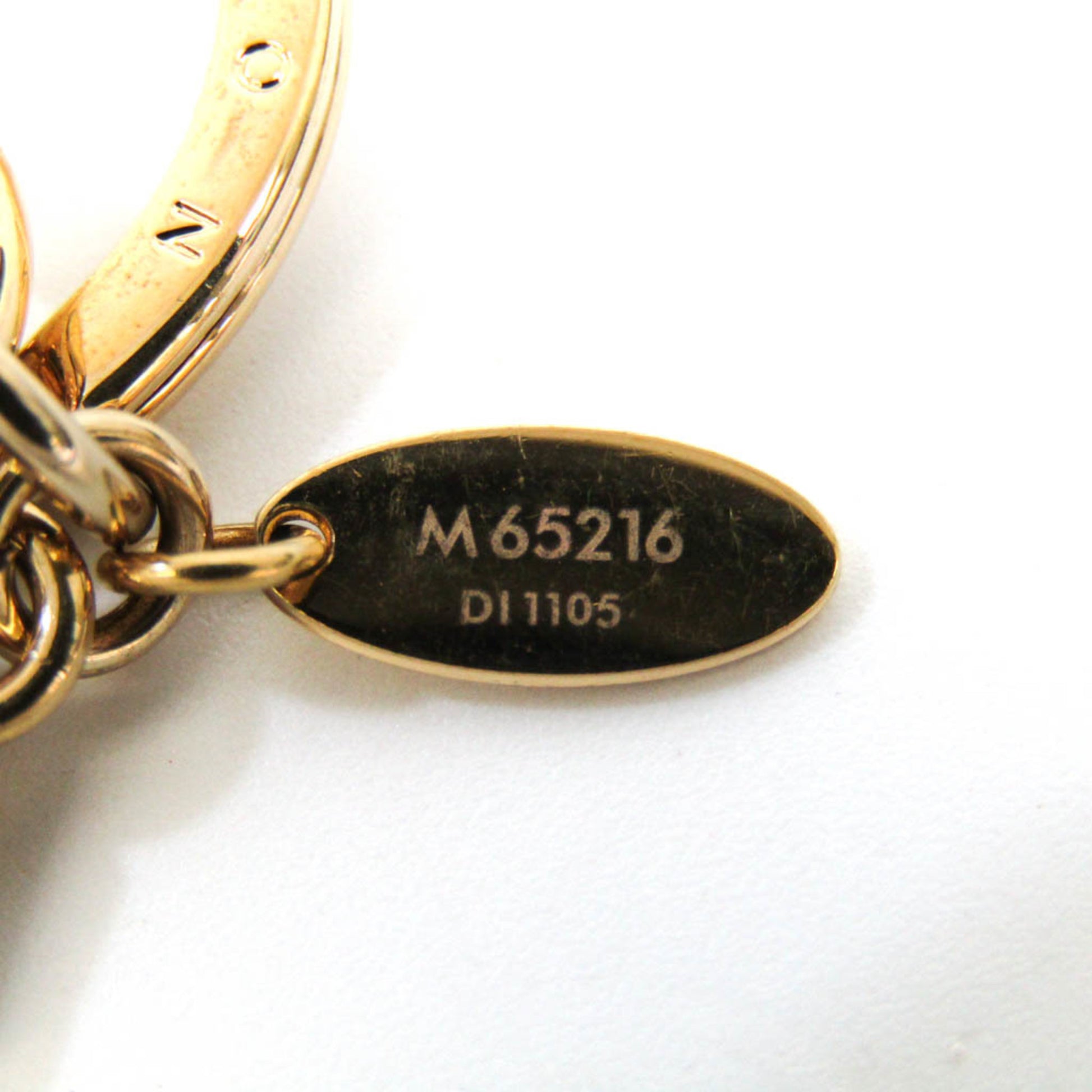 Louis Vuitton, Accessories, Louis Vuitton Facet Key Holder M6526 Keyring  Gold