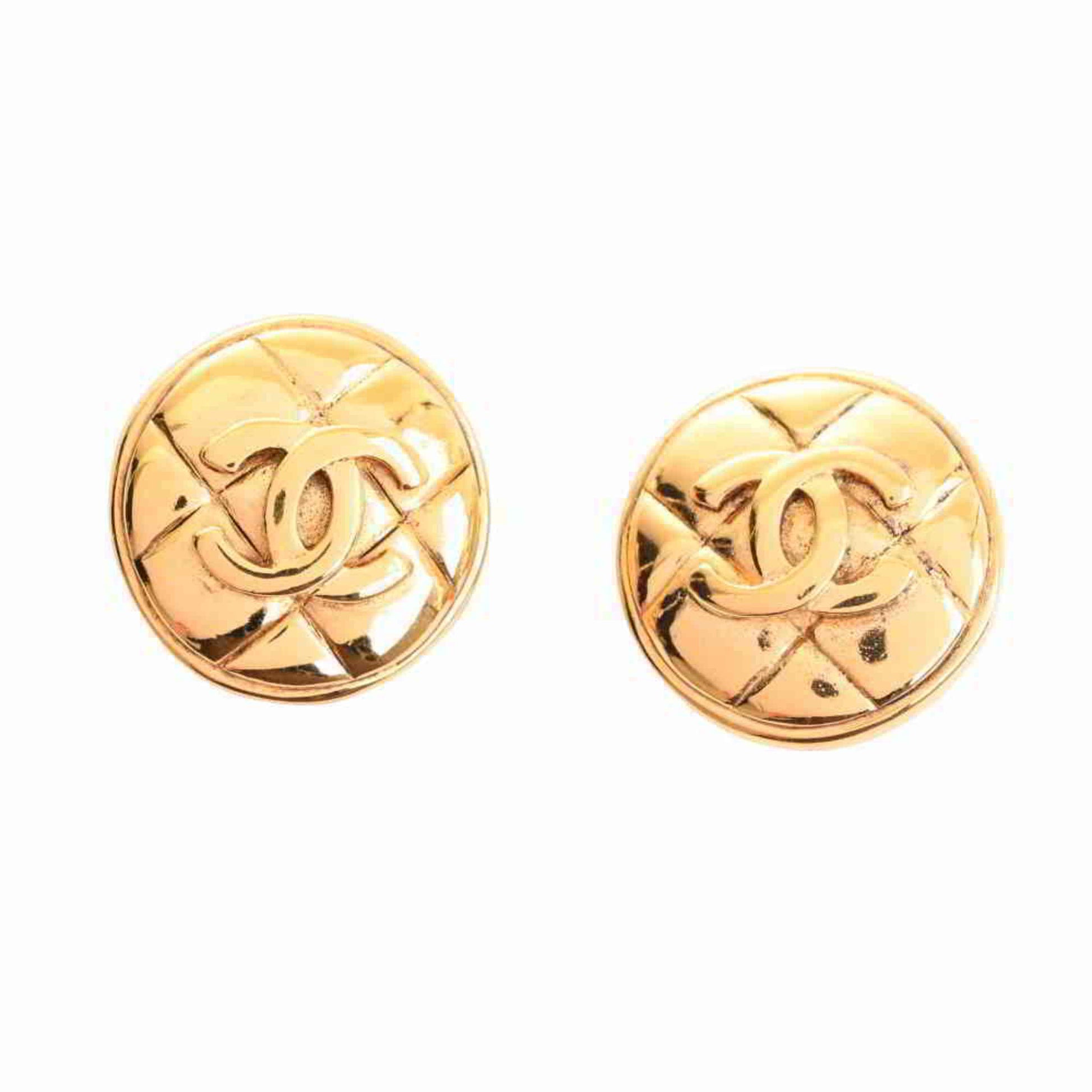 Chanel matelasse here mark button earrings gold metal