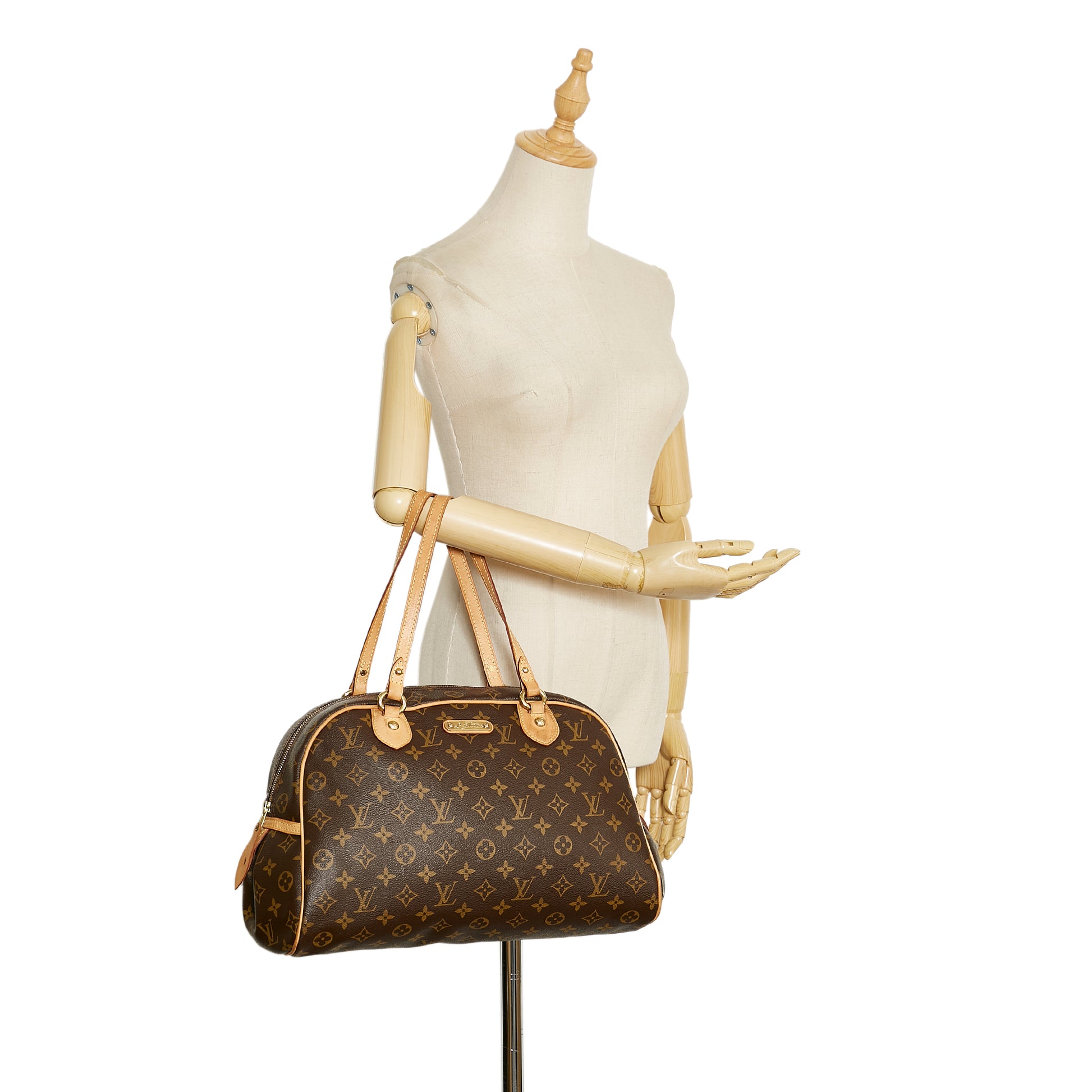 LOUIS VUITTON. Montorgueil model. Handbag in monogram c…