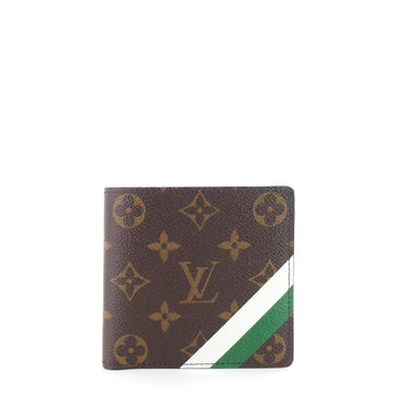 A LIMITED EDITION GREEN TUFFETAGE MONOGRAM WALLET TRUNK WITH GREEN