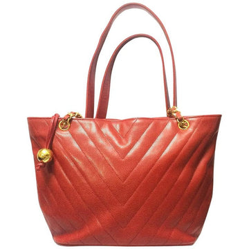 CHANEL Vintage red caviarskin v stitch, chevron style chain shoulder tote bag with golden CC ball charm