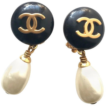 CHANEL Vintage teardrop white faux pearl earrings with black and golden CC mark on top