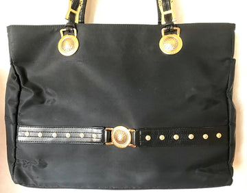 GIANNI VERSACE Vintage large black nylon and leather combination tote bag with gold tone sunburst motifs and chains