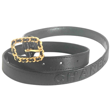 CHANEL Vintage black skinny belt with golden chain buckle and logo stitch