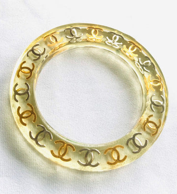 CHANEL Vintage resin bangle, bracelet with gold and silver CC marks