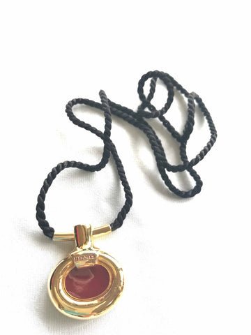 HERMES Vintage golden and red stone charm pendant top necklace with black strings