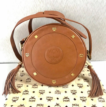 MCM Vintage suzy wong bag, brown grained leather round shoulder bag with studs and fringes