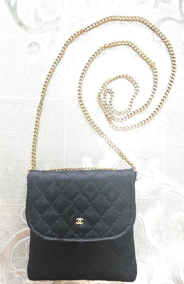 CHANEL Vintage black quilted satin fabric mini pouch, coin purse, long necklace with golden chain and CC motif