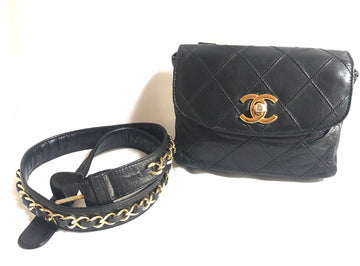 CHANEL Vintage black leather waist purse, fanny pack with golden chain belt and CC closure hock