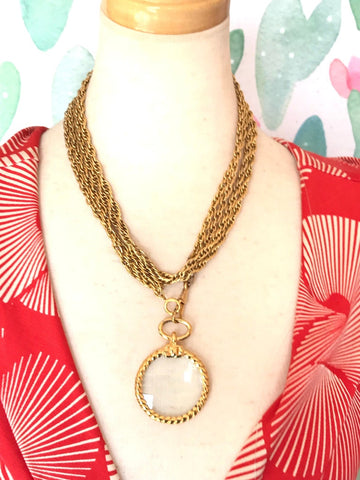 CHANEL Vintage long chain necklace with round loupe glass pendant top and CC motif