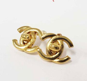 CHANEL Vintage golden turn lock CC earrings