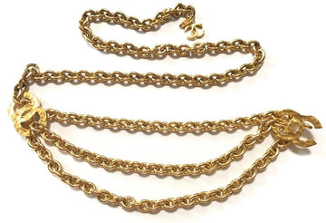 CHANEL Vintage gold chain belt with triple layer chains and two large CC mark charms at sides