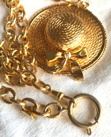 CHANEL Vintage golden chain necklace with dangling hat top