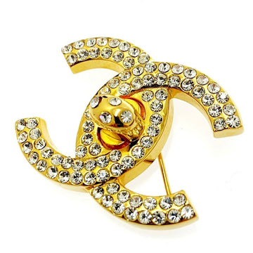 CHANEL Vintage golden turn lock CC pin brooch with crystals