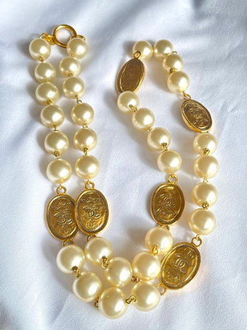 CHANEL Vintage classic faux pearl necklace with oval CC coin charms