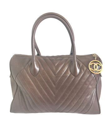 CHANEL Vintage brown caviarskin v stitch, chevron style bag, Speedy bag with golden CC charm