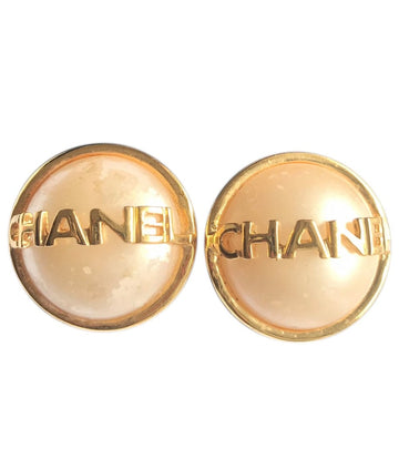 CHANEL Vintage gold tone round earrings with faux pearl and logo on it