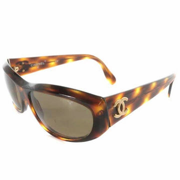 CHANEL Vintage brown frame and grey shade sunglasses with golden CC motifs at sides