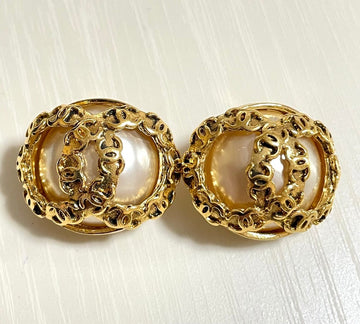 CHANEL Vintage large golden faux pearl CC earrings with mini coco marks