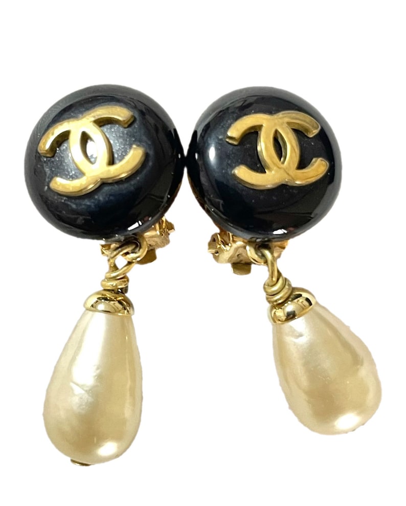 CHANEL Vintage teardrop white faux pearl earrings with black and golde