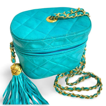 CHANEL Vintage emerald blue leather chain shoulder bag with CC tassel in lunchbox shape