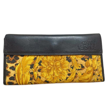 GIANNI VERSACE Vintage black leather wallet with its iconic leopard and arabesque print