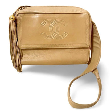 CHANEL Vintage beige lamb leather camera bag style chain shoulder purse with gold tone chain strap and fringe
