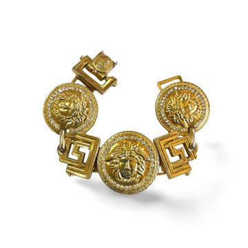 GIANNI VERSACE Vintage gold tone medusa face motif bracelet with crystals