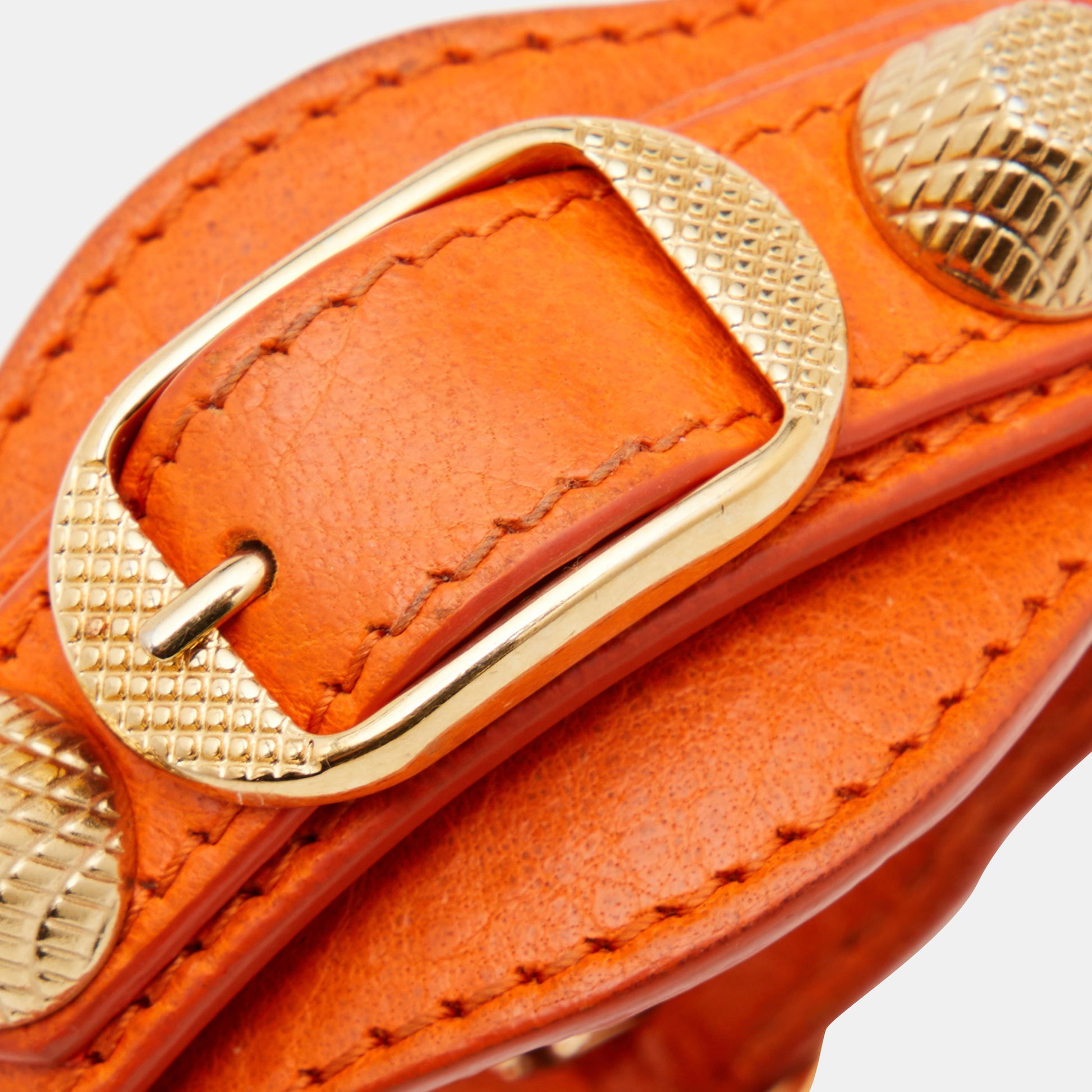Gladys Besiddelse Outlaw Balenciaga Orange Leather Gold Tone Studded Giant Arena Bracelet