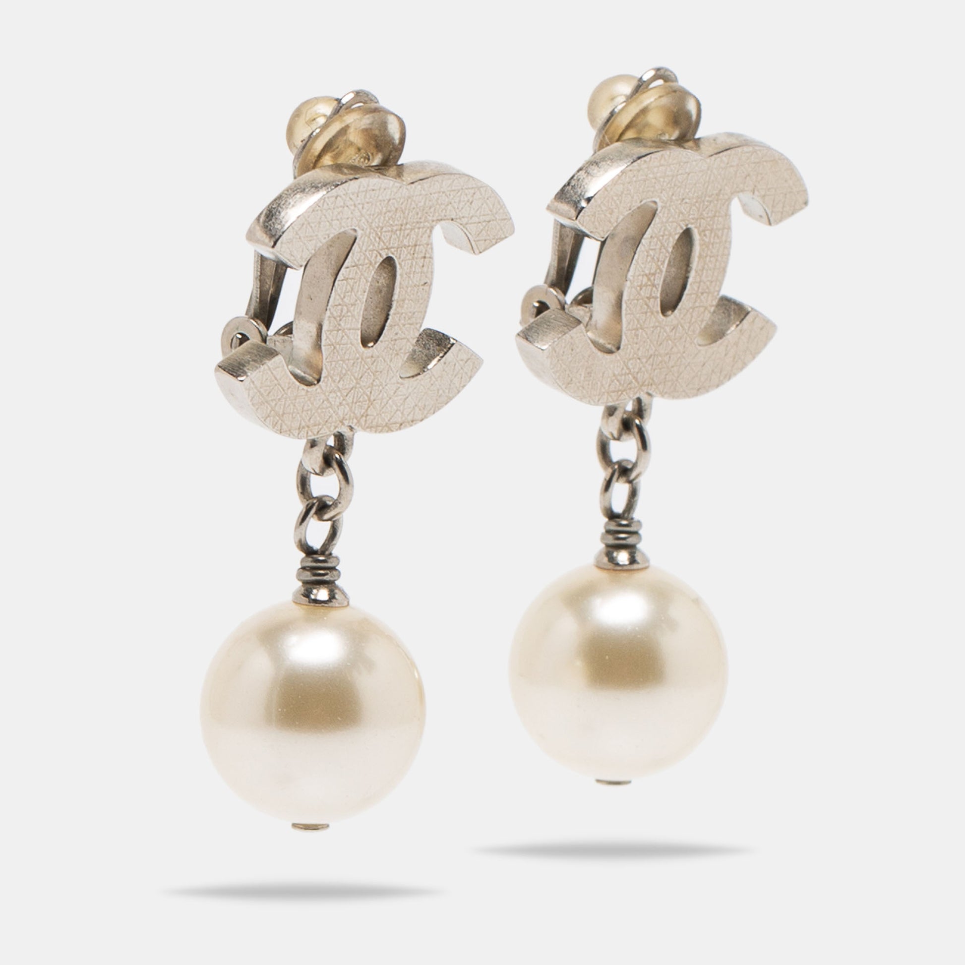 Chanel 2010s Silver Quilted CC Faux Pearl Drop Stud Earrings · INTO