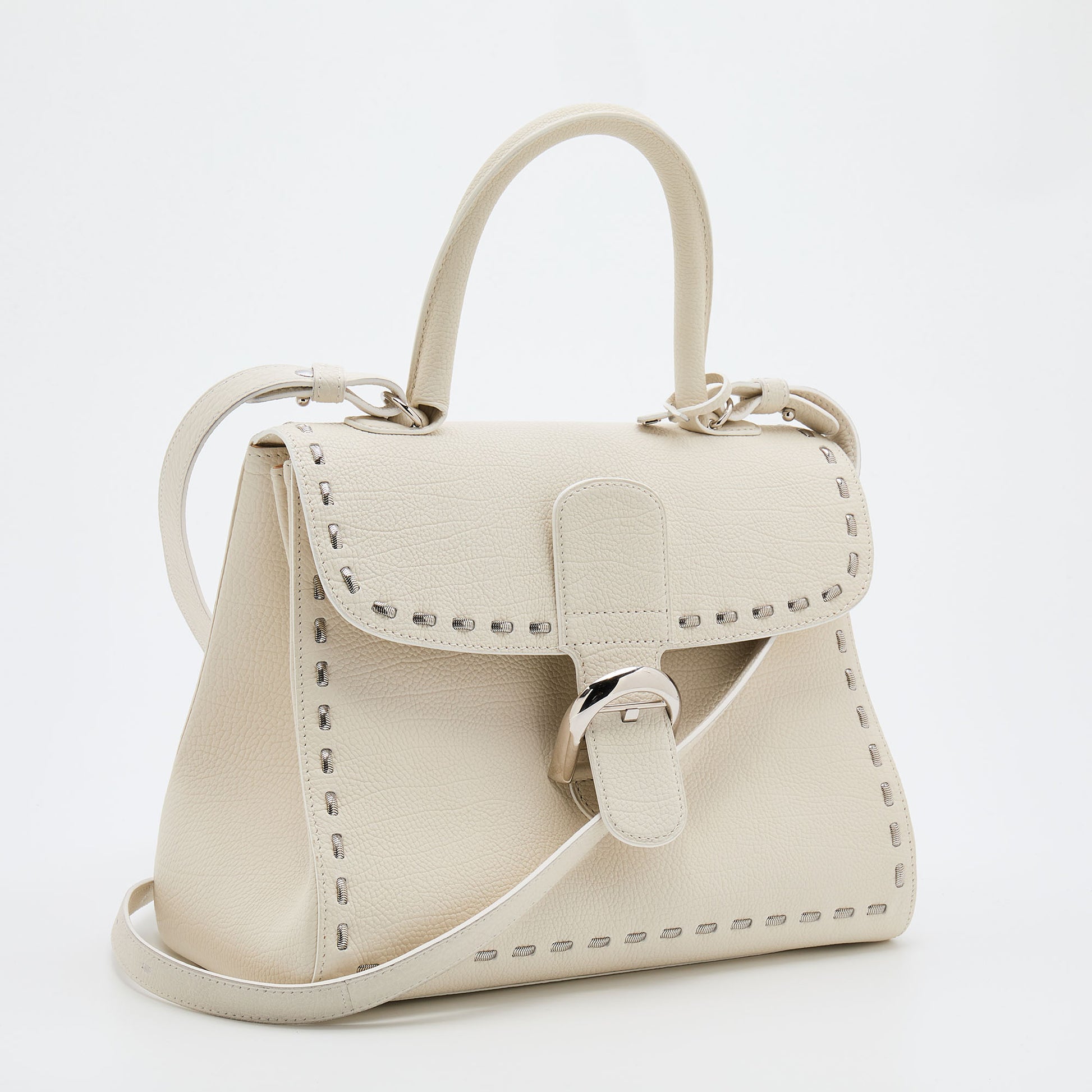 Small Delvaux Pin in cognac colour with white stitching