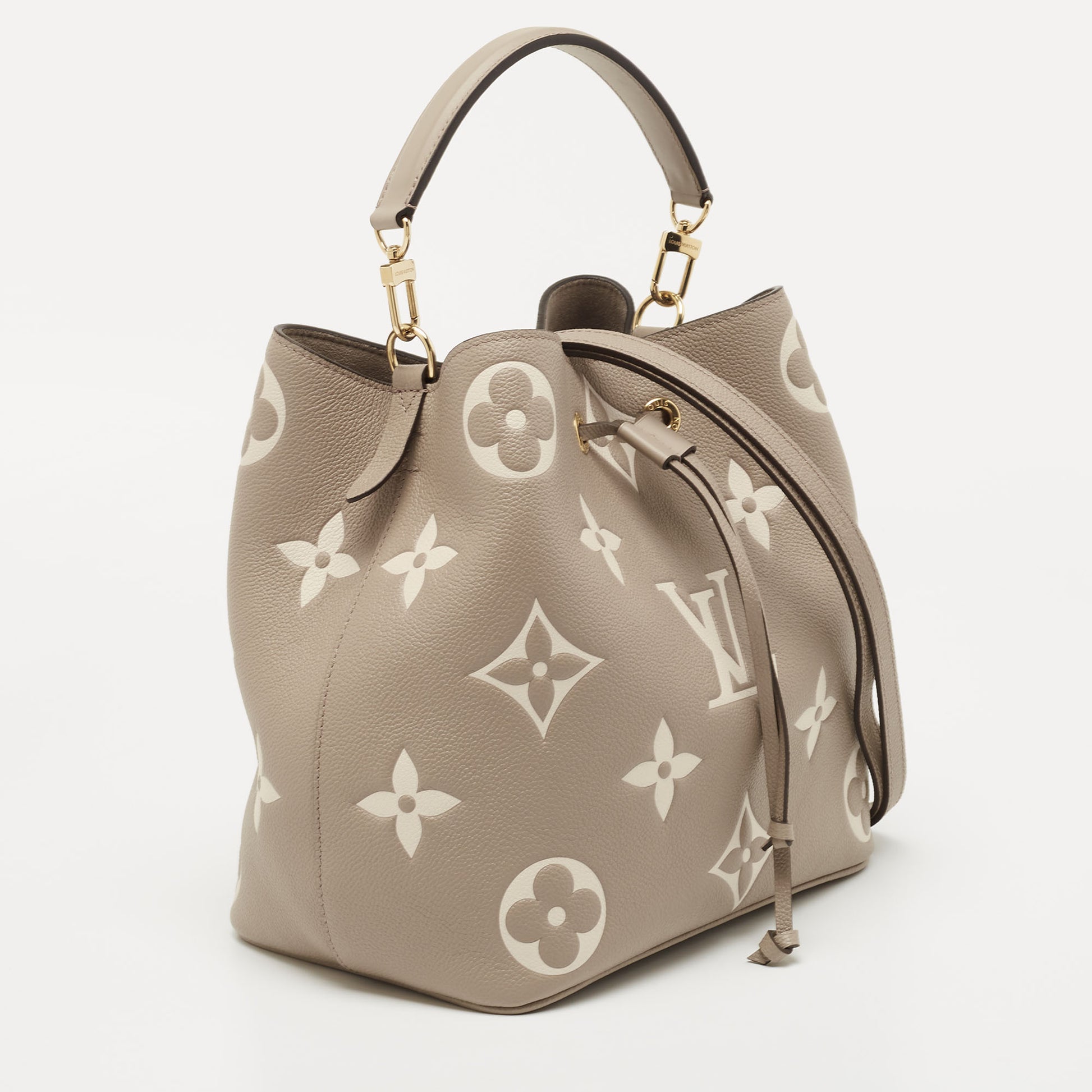 Louis Vuitton Torterelle/Cream Monogram Empreinte Leather NeoNoe MM Bag  Louis Vuitton | The Luxury Closet