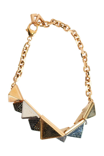 LOUIS VUITTON Gold, silver and black crystal bracelet with connecting pyramids and clip fastening with LV branding
