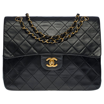 CHANEL Timeless medium 25 cm bag with double flap in black quilted leather, GHW