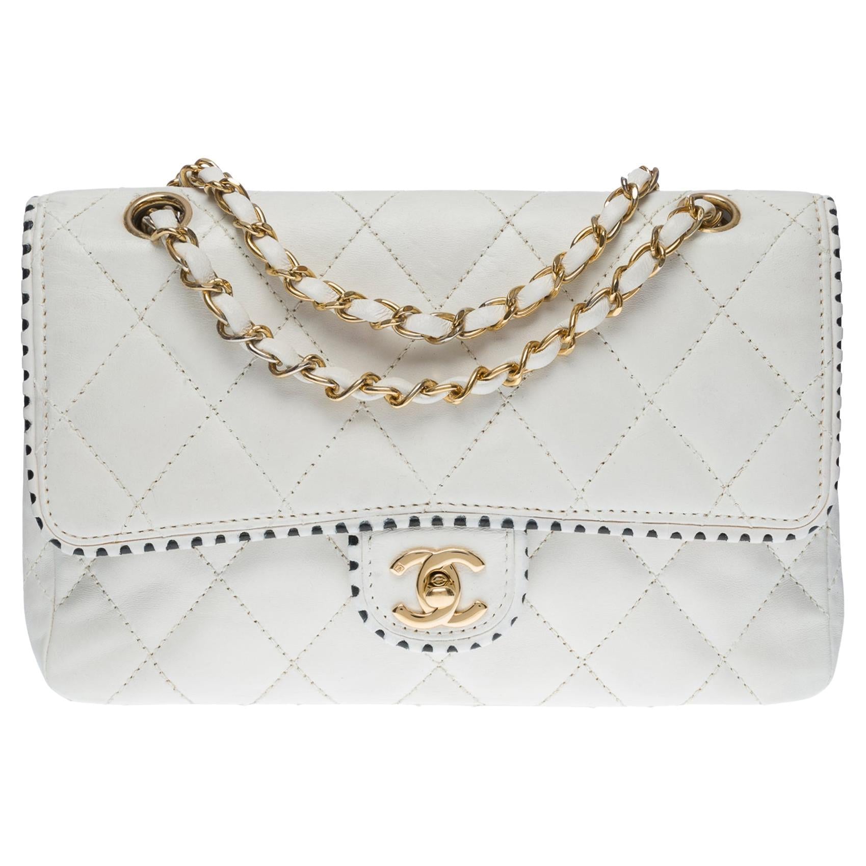 CHANEL Timeless Medium single flap shoulder bag in white quilted leath