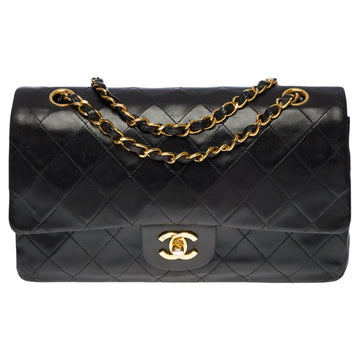 CHANEL Timeless Medium double flap shoulder bag in black quilted lambskin , GHW