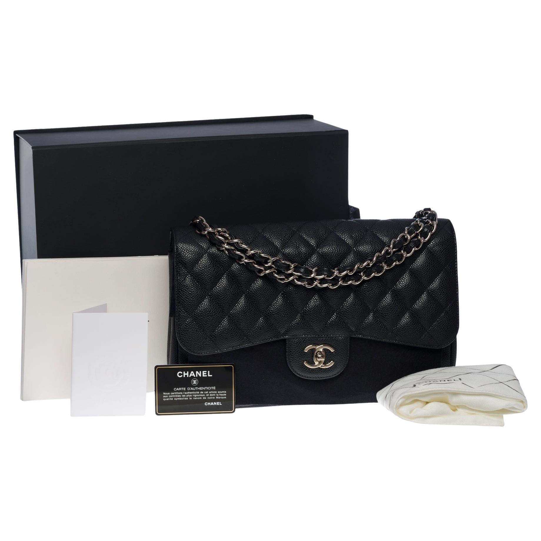 CHANEL Timeless Jumbo double flap bag in black quilted caviar leather