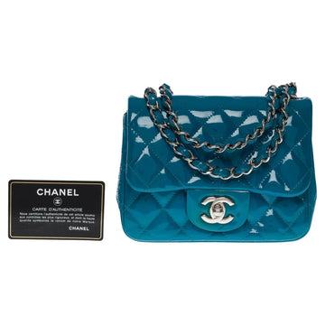 CHANEL Stunning Mini Timeless shoulder bag in Blue quilted patent leather, SHW